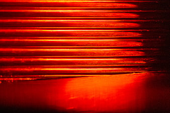 Abstract Red Light Streaks and Automotive Texture Background