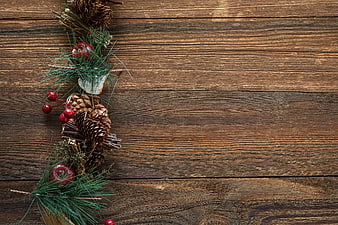 Christmas decorations on rustic wooden background with copy space