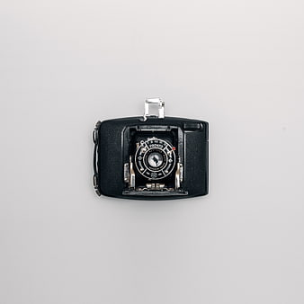 Vintage Black Film Camera on White Background