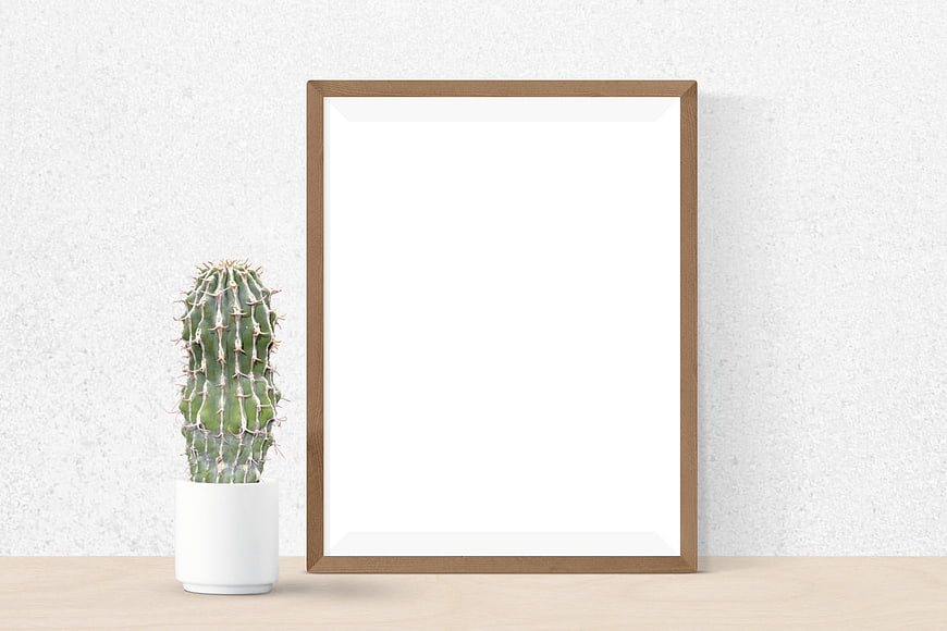 Minimalist Wooden Picture Frame Mockup with Cactus on Desk