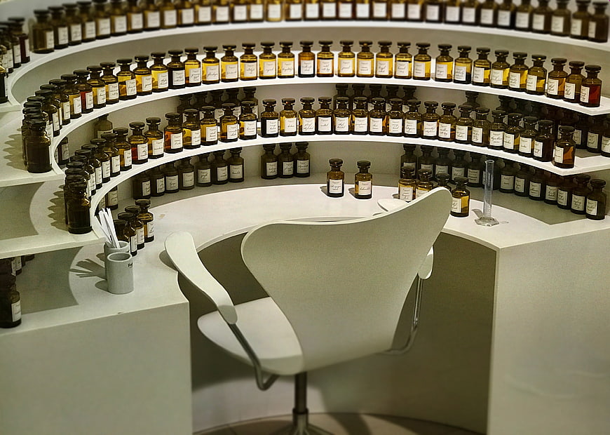 Perfumer's Workstation With Curved Amber Bottle Display