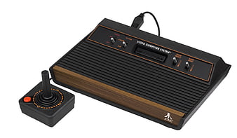 Atari 2600 Video Computer System with Wood Grain Panel and Joystick Controller