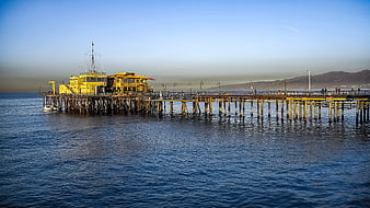Yellow Santa Monica Pier at Sunrise Over Pacific Ocean