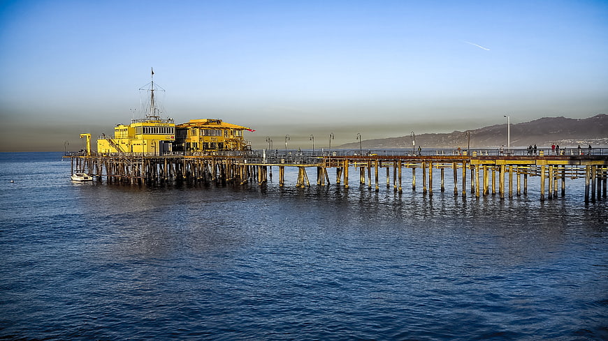 Yellow Santa Monica Pier at Sunrise Over Pacific Ocean