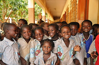 Group of smiling African school children in uniforms