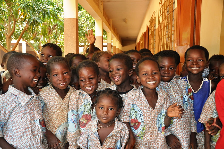 Group of smiling African school children in uniforms