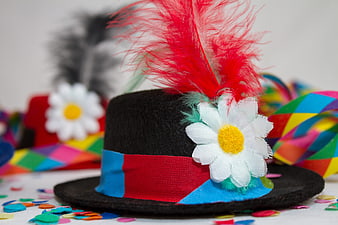 Black Carnival Hat With Red Feathers And White Flower Decoration