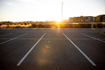 Empty Parking Lot at Sunset with Leading Lines
