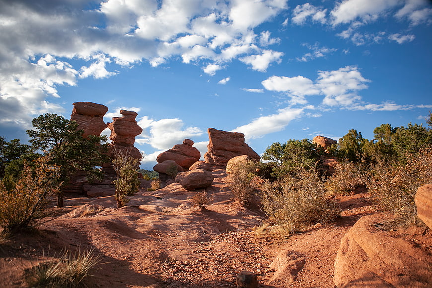 Red Rock Formations in Desert Landscape Under Blue Sky