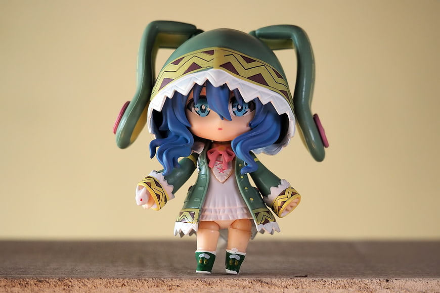Cute Nendoroid Anime Figurine With Blue Hair And Green Hood