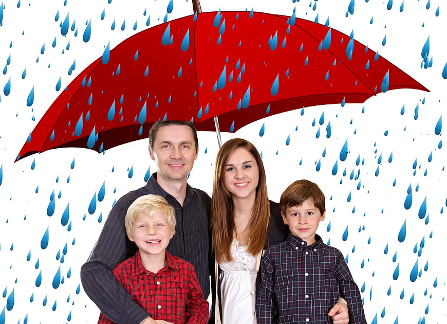 Family Under Red Umbrella With Rain Drops