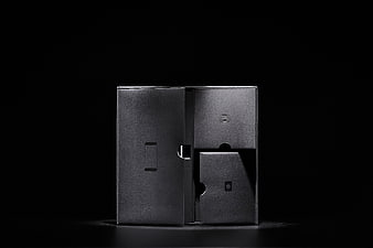 Minimalist Black Product Packaging Box on Dark Background