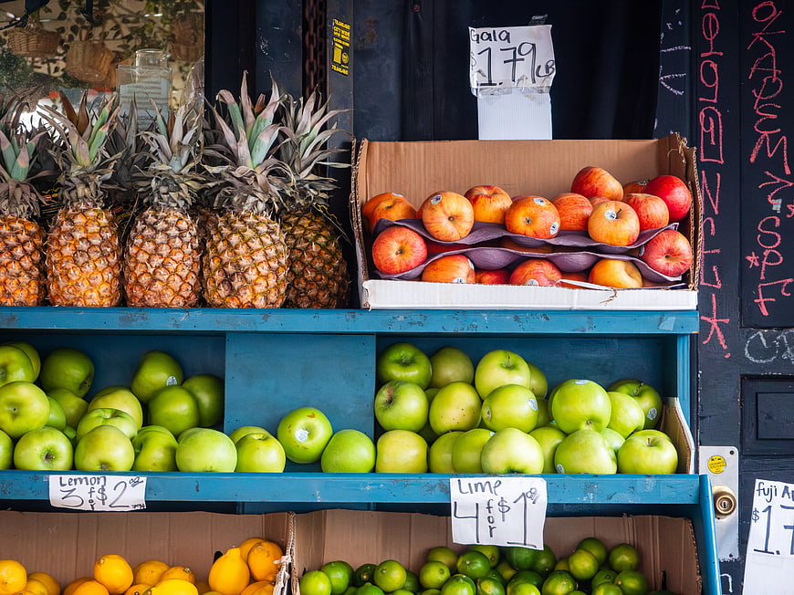 Fresh Fruit Stand Display with Pineapples and Apples