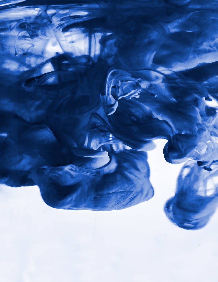 Abstract Blue Ink Swirling in Water