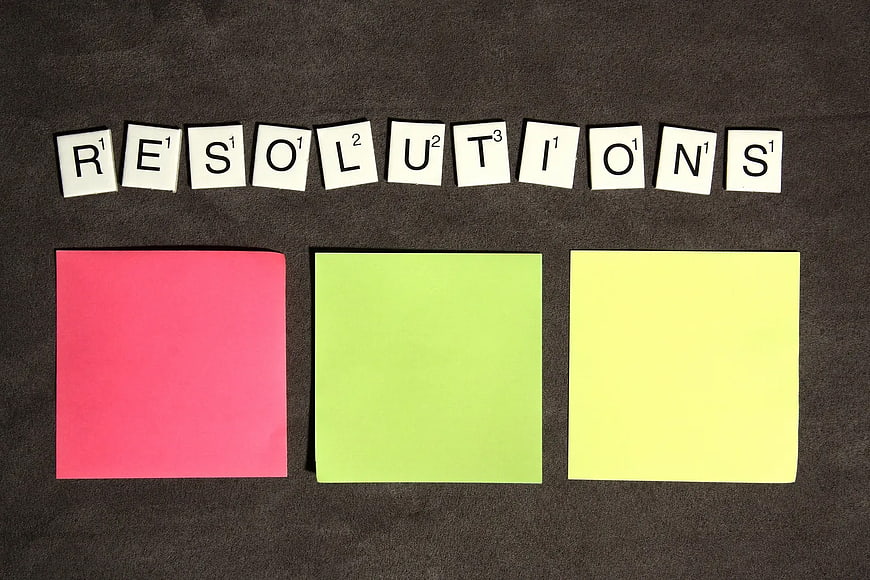 Solutions spelled with Scrabble tiles and sticky notes