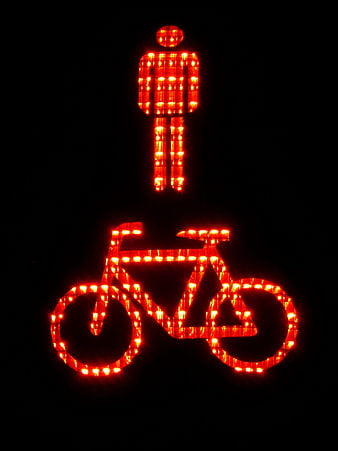Red LED bicycle traffic signal at night