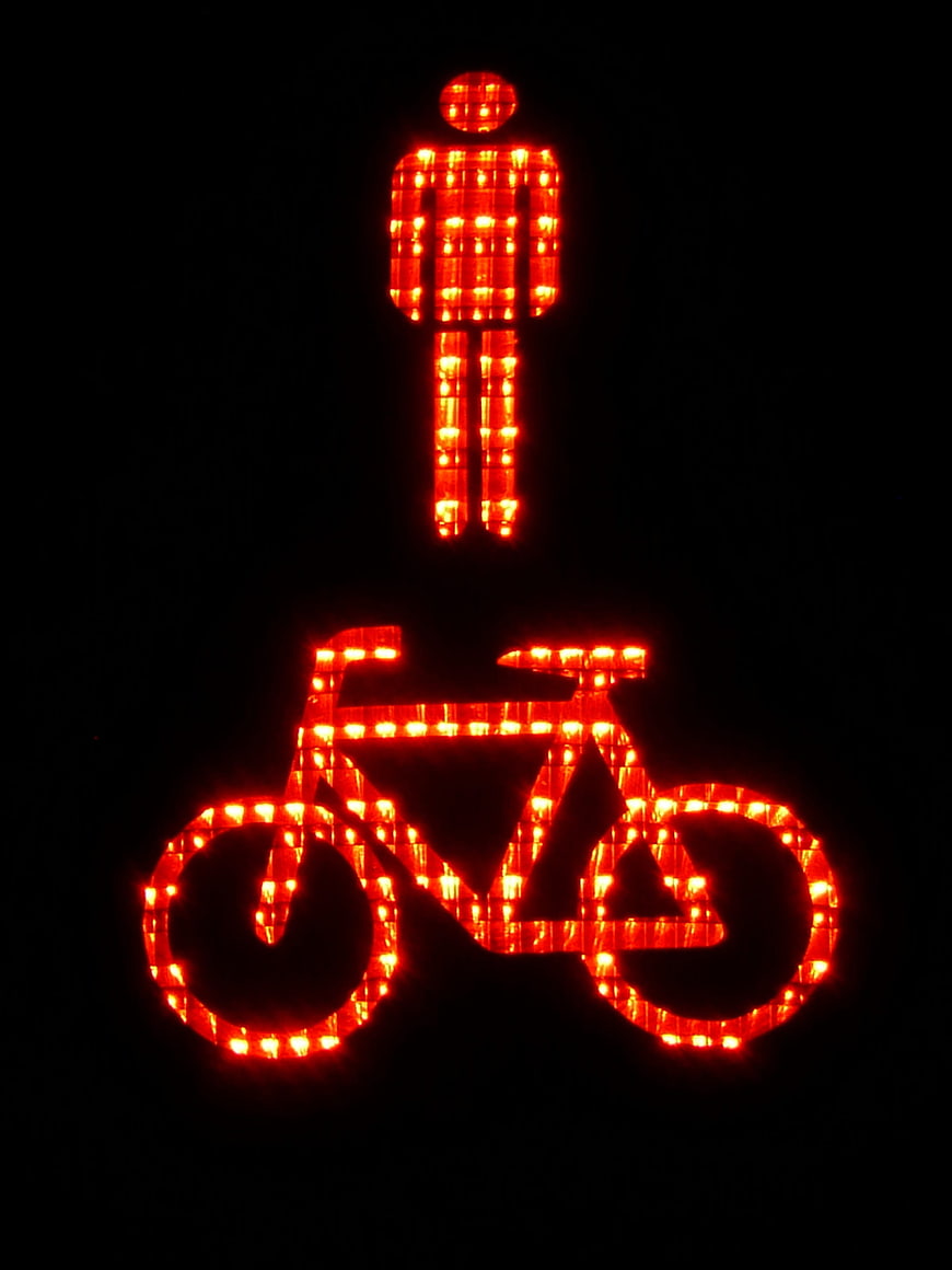 Red LED bicycle traffic signal at night