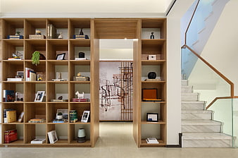 Modern Wooden Bookshelf Wall With Staircase And Interior Design