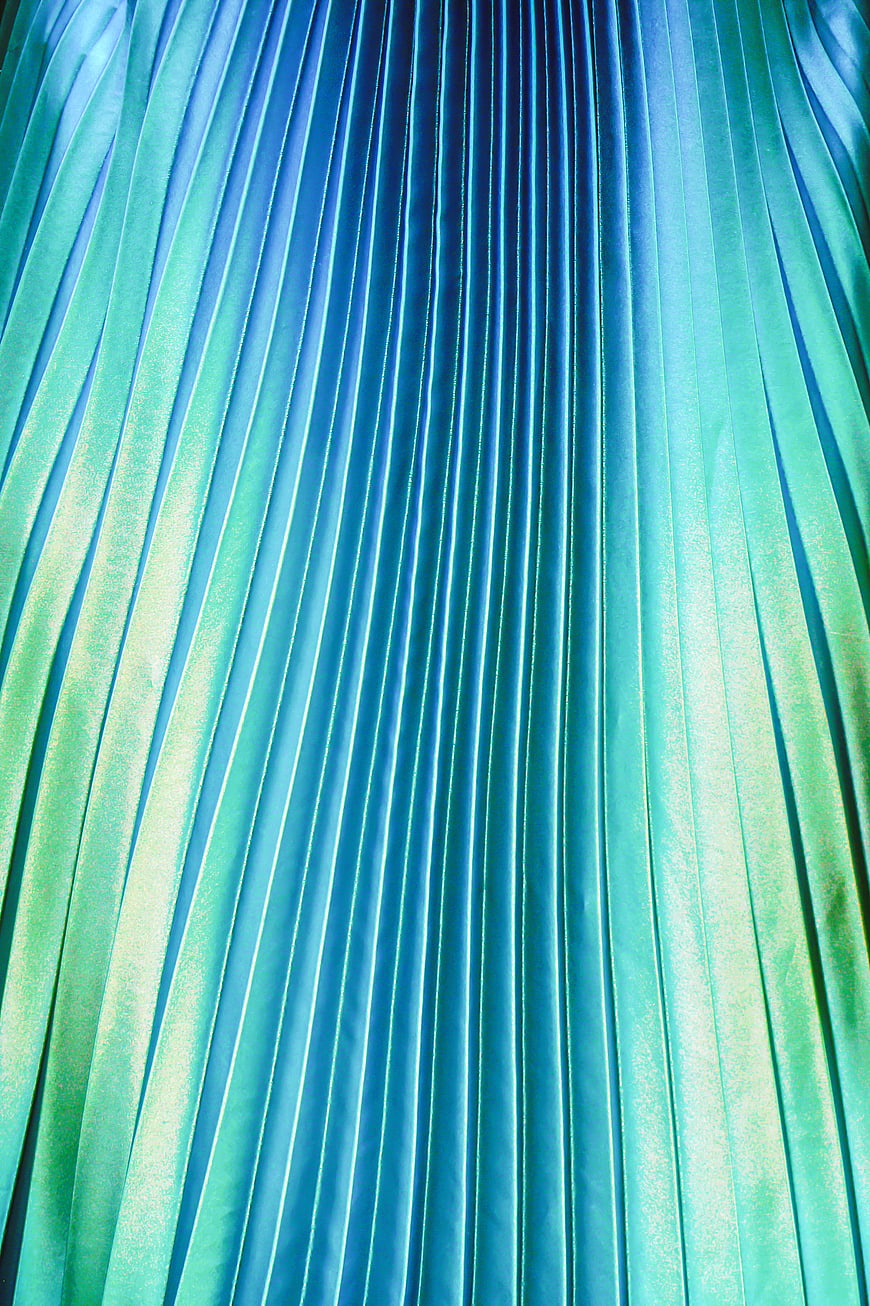 Abstract Blue and Green Pleated Fabric Texture Background