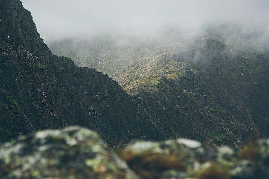 Misty Mountain Landscape with Foreground Rocks