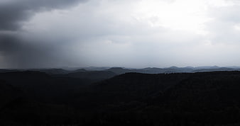 Dark Stormy Mountain Landscape with Heavy Clouds