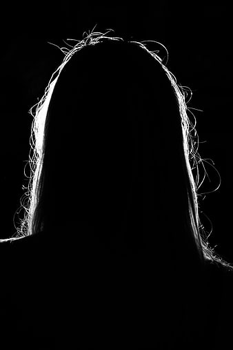 Backlit Silhouette of Woman's Head and Hair