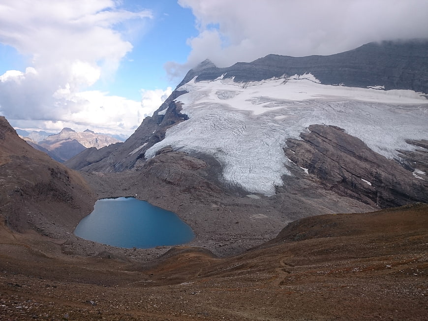 Alpine Glacier and Turquoise Lake in Swiss Mountains