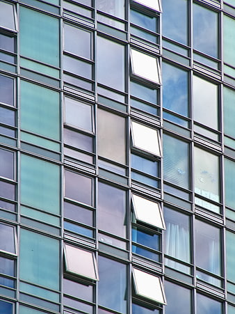 Modern Glass Office Building Facade with Open Windows
