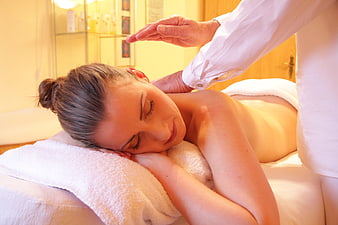 Woman receiving relaxing spa massage therapy