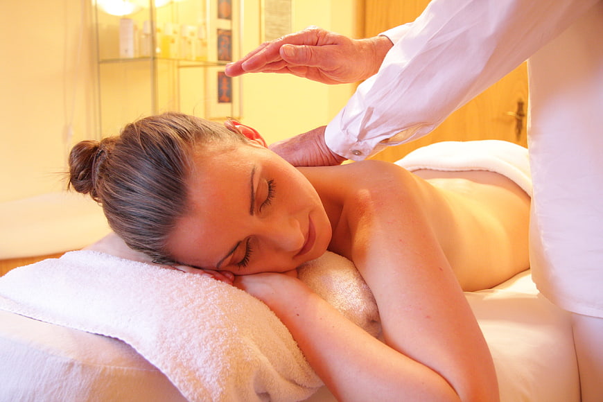 Woman receiving relaxing spa massage therapy