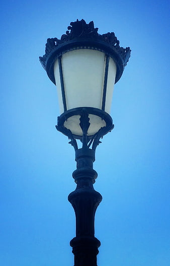 Vintage Street Lamp Against Blue Sky