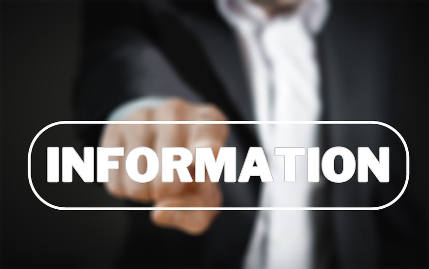 Businessman touching virtual information button interface