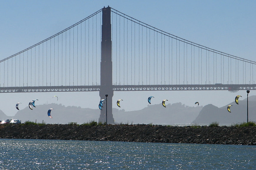 Kitesurfers under the Bay Bridge in San Francisco