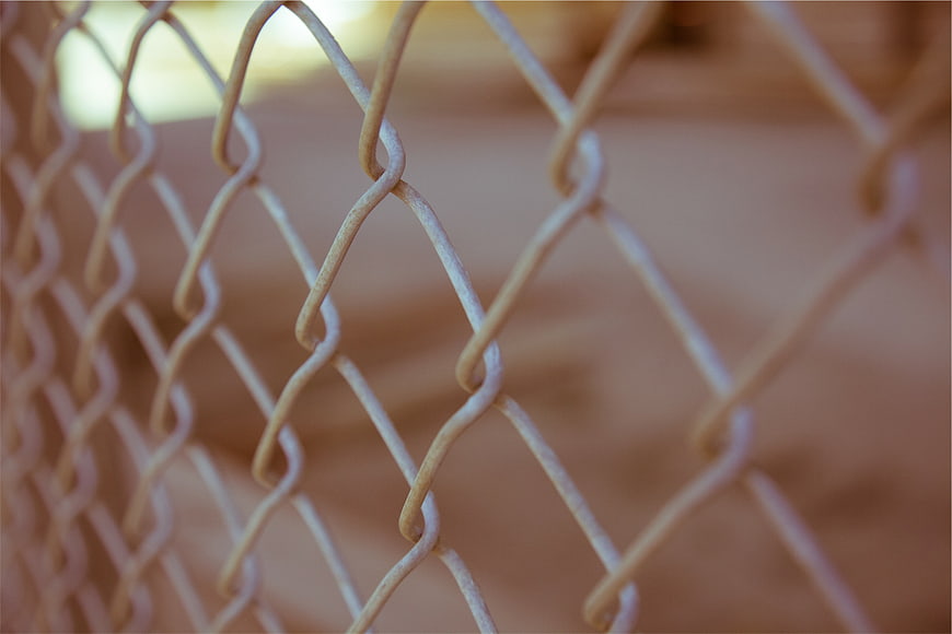 Close-up of Chain Link Fence with Blurred Background