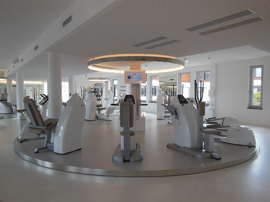 Modern Luxury Gym Interior With White Fitness Equipment