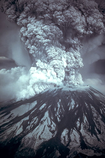 Dramatic volcanic eruption with massive ash cloud and lava flows