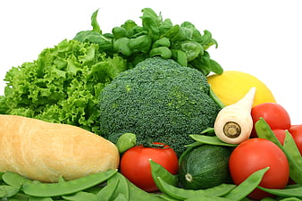 Fresh Vegetables and Bread on White Background