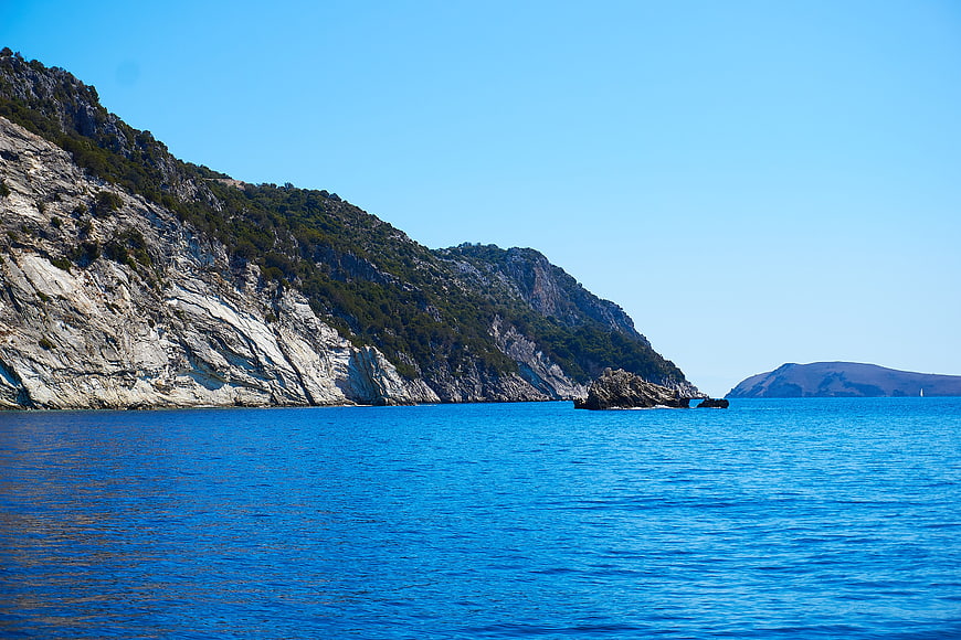 Scenic Mediterranean Coastline with Rocky Cliffs and Blue Sea