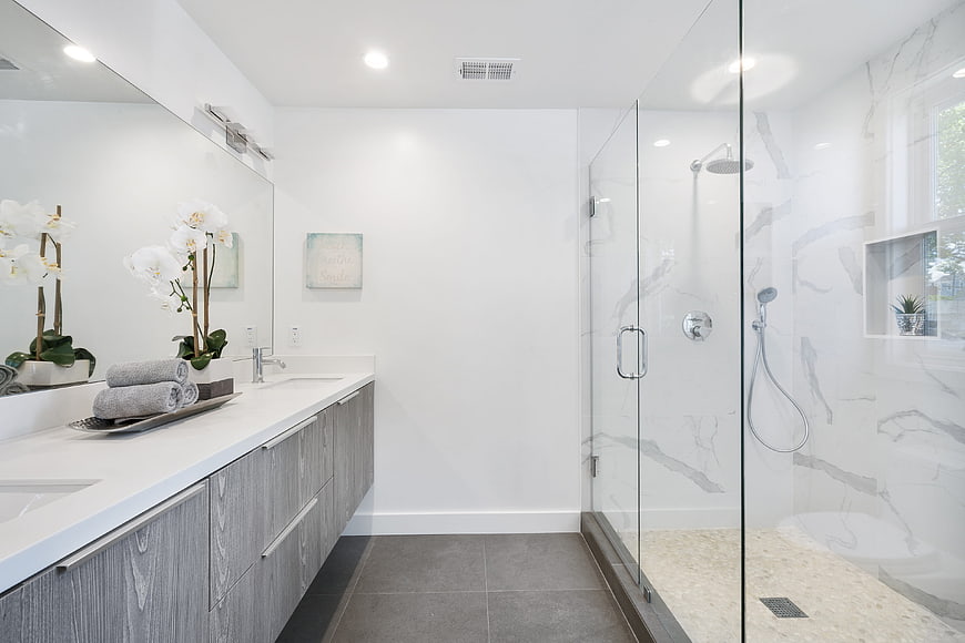 Modern Luxury Bathroom Interior With Marble Shower And Gray Vanity