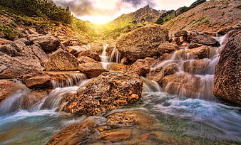 Majestic Mountain Stream with Long Exposure Waterfall