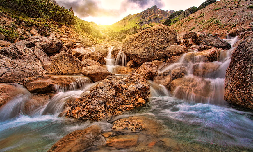 Majestic Mountain Stream with Long Exposure Waterfall
