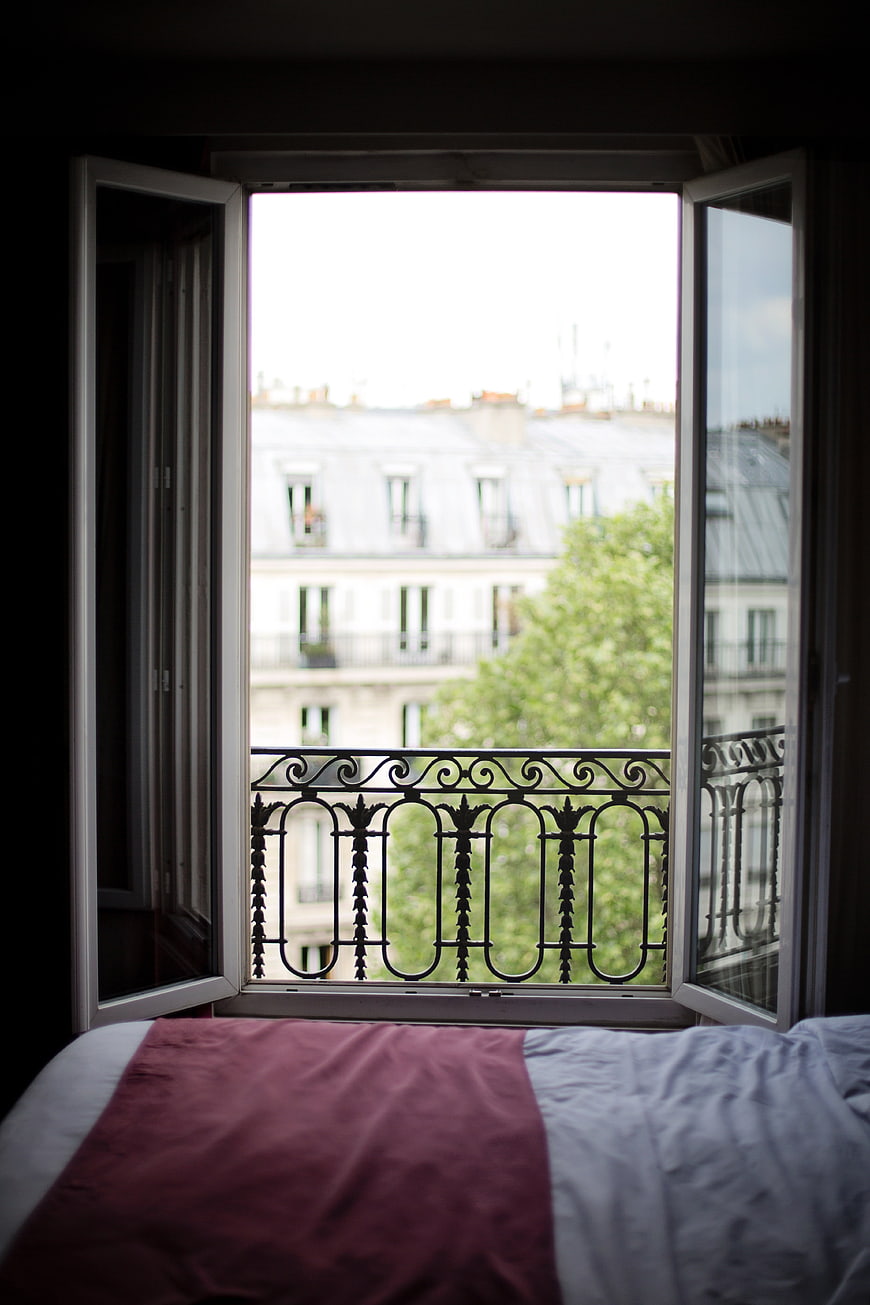 Parisian Hotel Room View Through Open Window