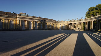 Grand Baroque Palace Courtyard with Long Shadows