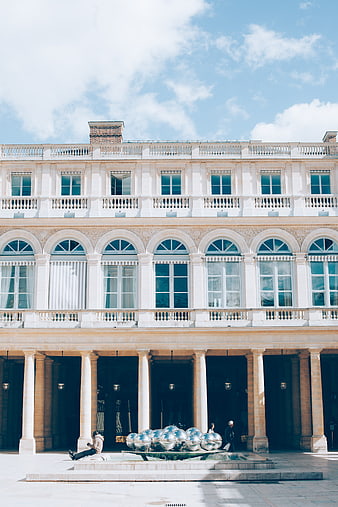 Classical European Architecture with Modern Sculpture
