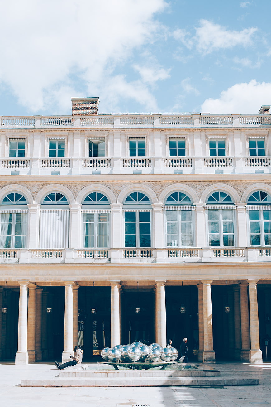 Classical European Architecture with Modern Sculpture
