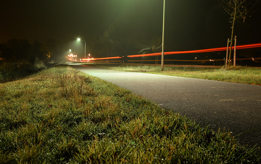 Long Exposure Night Road with Red Light Trails