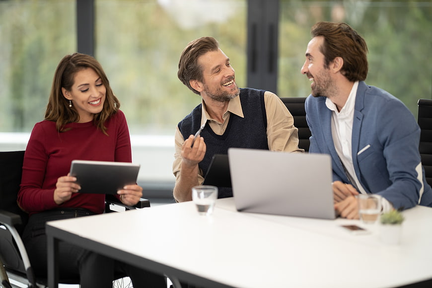 Happy business team meeting in modern office