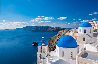 Iconic Blue Domes of Santorini Greece with Caldera View