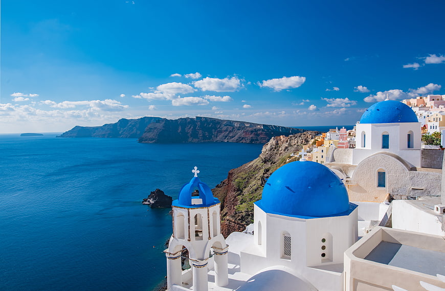 Iconic Blue Domes of Santorini Greece with Caldera View