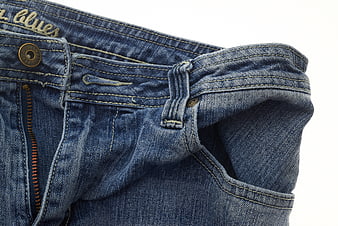 Close-up of Blue Denim Jeans Waistband and Pocket
